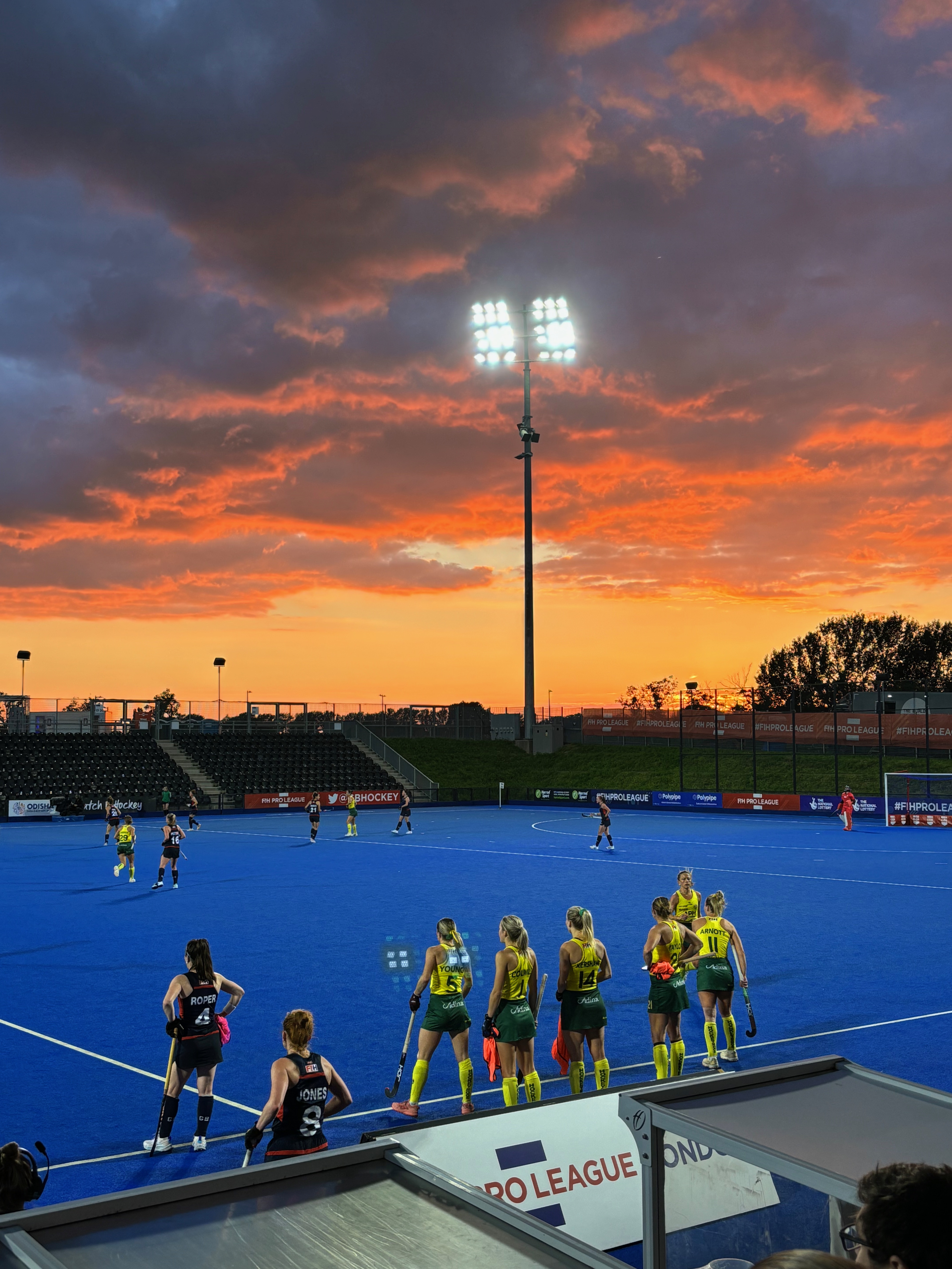 sunset over a hockey pitch